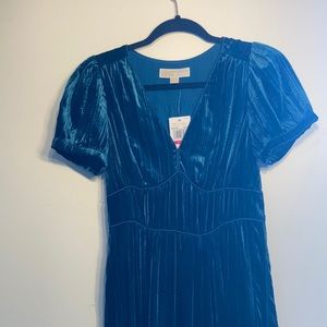 I bought this dress brand new but it’s too small